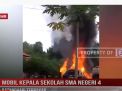 MOBIL KEPALA SEKOLAH SMA NEGERI 4 BATANGHARI TERBAKAR