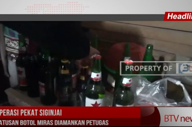 OPERASI PEKAT SIGINJAI,RATUSAN BOTOL MIRAS DIAMANKAN PETUGAS